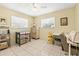 Cozy bedroom with large windows providing ample natural light at 1410 Brighton Ct, Palm Harbor, FL 34684