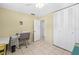 Bedroom with closet, workspace, and neutral color scheme at 1410 Brighton Ct, Palm Harbor, FL 34684
