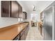 Spacious kitchen featuring stainless steel appliances and tile flooring at 1410 Brighton Ct, Palm Harbor, FL 34684