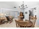Open concept living space with a dining area, living room, and kitchen view at 1410 Brighton Ct, Palm Harbor, FL 34684