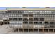 Exterior view of building with ample parking, providing easy access to all the units at 14900 Gulf Blvd # 308, Madeira Beach, FL 33708