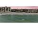 Beachfront condo building with stunning ocean views and white sand beach at 14900 Gulf Blvd # 308, Madeira Beach, FL 33708