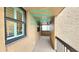 Hallway access showcasing elevator and convenient storage distance from the unit's front door at 14900 Gulf Blvd # 308, Madeira Beach, FL 33708