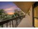 Exterior condo walkway featuring palm trees and a beautiful view at 14900 Gulf Blvd # 308, Madeira Beach, FL 33708