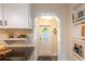 Bright kitchen doorway leading to the pool area at 1512 56Th N Ave, St Petersburg, FL 33703