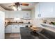 Charming kitchen featuring white cabinets, dark countertops, and stainless steel appliances at 1512 56Th N Ave, St Petersburg, FL 33703