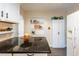 Charming kitchen featuring a dark countertop island and additional storage at 1512 56Th N Ave, St Petersburg, FL 33703