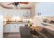 Charming kitchen featuring white cabinets, dark countertops, and stainless steel appliances at 1512 56Th N Ave, St Petersburg, FL 33703