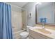 Cozy bathroom with combined tub and shower and a vanity at 1515 Bayshore Blvd # 38, Dunedin, FL 34698