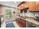 Bright kitchen with granite countertops and an undermount stainless steel sink at 1515 Bayshore Blvd # 38, Dunedin, FL 34698