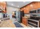 Modern kitchen featuring granite countertops and stainless steel appliances at 1515 Bayshore Blvd # 38, Dunedin, FL 34698