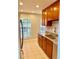 Modern kitchen featuring granite countertops, stainless steel sink, and ample cabinet space at 1515 Bayshore Blvd # 38, Dunedin, FL 34698
