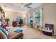 Bright home office with dual monitors, a ceiling fan, and natural light from two windows at 1515 Bayshore Blvd # 38, Dunedin, FL 34698