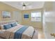 Comfortable bedroom features a bed, soft lighting, and a calming ambiance for relaxation and rest at 1604 Comfy Ct, Sun City Center, FL 33573