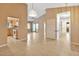Open dining space with tile floors, access to living area and kitchen at 1604 Comfy Ct, Sun City Center, FL 33573
