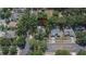 Aerial view of a home in a neighborhood with mature trees and well-maintained lawns at 1613 Long Pond Dr, Valrico, FL 33594