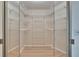 A walk-in closet with metal shelving at 1613 Long Pond Dr, Valrico, FL 33594