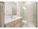Modern bathroom featuring sleek vanity, quartz counters and a glass enclosed shower at 17566 Hyland Ln, Dade City, FL 33523