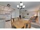 Inviting living room and kitchen boasts a flowing layout and comfortable seating arrangements at 1802 Bedford Ter # 185, Sun City Center, FL 33573