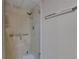 Modern glass shower with tile surround and sleek hardware at 1802 Bedford Ter # 185, Sun City Center, FL 33573
