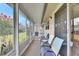 Inviting sunroom with ample seating and natural light, ideal for relaxation and enjoying outdoor views at 1802 Bedford Ter # 185, Sun City Center, FL 33573