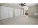 Bedroom view of large closet and connected bathroom with single vanity at 1813 Lakeview Dr, Brandon, FL 33511