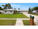 Charming single-story home featuring a well-maintained lawn and inviting curb appeal at 1813 Lakeview Dr, Brandon, FL 33511