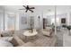 Wide open living room with stylish decor and view to dining room at 1813 Lakeview Dr, Brandon, FL 33511