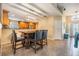 Warm dining area adjacent to the modern kitchen, creating an inviting atmosphere at 2016 Chelam Way, Brandon, FL 33511