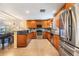 Well-equipped kitchen boasts ample cabinet space and stainless-steel appliances at 2016 Chelam Way, Brandon, FL 33511