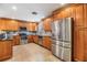 Well-equipped kitchen boasts ample cabinet space and stainless-steel appliances at 2016 Chelam Way, Brandon, FL 33511
