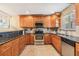 Well-equipped kitchen boasts ample cabinet space and stainless-steel appliances at 2016 Chelam Way, Brandon, FL 33511