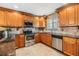 Well-equipped kitchen boasts ample cabinet space and stainless-steel appliances at 2016 Chelam Way, Brandon, FL 33511