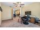 Bright home office featuring neutral walls, a ceiling fan, and well-placed desk for maximum productivity at 2016 Chelam Way, Brandon, FL 33511