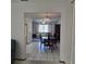 View from dining area into living room of an open-concept home at 2226 Giralda Ave, Spring Hill, FL 34606