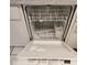 The interior of the dishwasher shows the layout for washing and drying dishes at 2226 Giralda Ave, Spring Hill, FL 34606