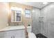 Updated bathroom featuring a sleek vanity, neutral paint and a stylish walk-in shower at 239 Freeport Ne Ave, St Petersburg, FL 33702