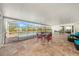 Inviting outdoor space featuring a pool, dining area, and cozy seating perfect for relaxation and entertainment at 239 Freeport Ne Ave, St Petersburg, FL 33702