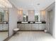 Bright bathroom with double vanity and chandelier at 2902 W Fair Oaks Ave, Tampa, FL 33611