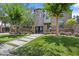 Stunning home boasts mature trees, lush lawn, and a secure gated entrance, creating an inviting curb appeal at 2902 W Fair Oaks Ave, Tampa, FL 33611