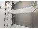 Tiled shower stall with rainfall shower head at 2902 W Fair Oaks Ave, Tampa, FL 33611