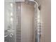 Luxurious bathroom shower with a rainfall shower head, body jets, and sleek, modern design at 2902 W Fair Oaks Ave, Tampa, FL 33611