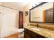Bathroom featuring shower/tub combination and granite topped vanity at 2969 La Concha Dr, Clearwater, FL 33762