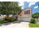 Lovely home with a tile roof, a two-car garage, and a well-maintained front yard at 2969 La Concha Dr, Clearwater, FL 33762