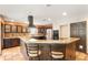 Beautiful kitchen with granite countertops, dark wood cabinets, and stainless steel appliances at 2969 La Concha Dr, Clearwater, FL 33762