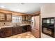 An elegant kitchen features stainless appliances, custom cabinets, and granite countertops at 2969 La Concha Dr, Clearwater, FL 33762