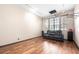 Cozy room with hardwood floors and a comfortable seating arrangement at 2969 La Concha Dr, Clearwater, FL 33762