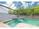 The swimming pool features a spa and stone pavers at 2969 La Concha Dr, Clearwater, FL 33762