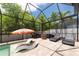 A screened in pool deck and pool offers a relaxing outdoor oasis at 2969 La Concha Dr, Clearwater, FL 33762