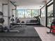 Bright gym space featuring modern weight training machines and treadmills in a naturally lit room at 300 S Florida Ave # 600L, Tarpon Springs, FL 34689